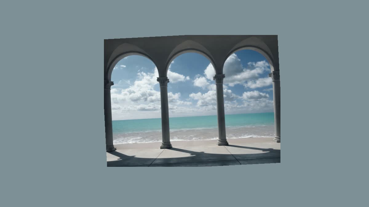 Center mode with a slight rotation over an auto-extracted background colour